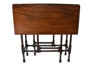 A Georgian style, mahogany gate-leg table with a rectangular top flanked by rectangular drop-le…