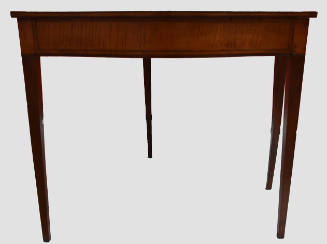 A Federal-style card table with a serpentine front and a fold-over top above a conforming friez…
