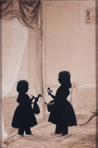 Silhouette of two girls in a bedroom. 