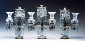 One of a set of three glass and ormulu garniture de cheminée argand lamps with etched glass glo…