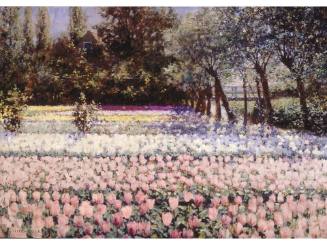 A field of tulips layered in varying colored rows progressing towards a line of trees obscuring…