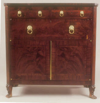 A Sheraton-style butler's desk with two small drawers at the top, a large central drawer and a …