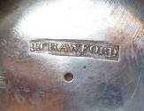 The maker's mark stamped on the bottom of the sugar bowl as "J.CRAWFORD" in a rectangle above a…