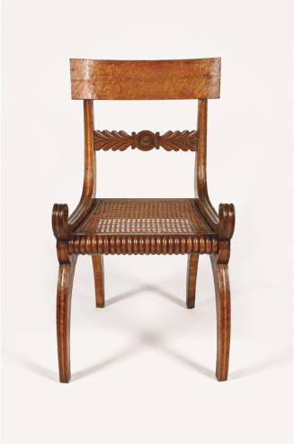 One of fifteen side chairs with a concave rectangular crest rail above a splat with a central m…