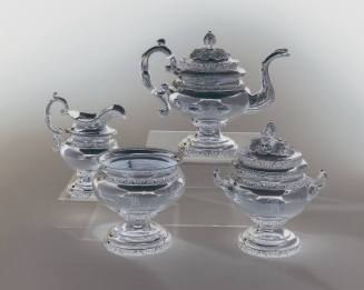 A four-piece silver tea service featuring Classical references in the form of acorn-shaped fini…
