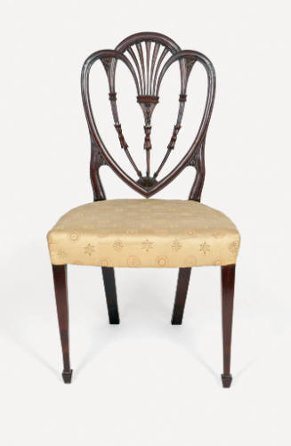 A mahogany side chair with a shield back (heart-shaped) in the American Hepplewhite-style with …