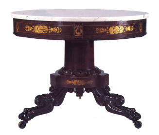A marble topped pedestal form table of ebonized and rosewood-grained mahogany, with a gilt-sten…