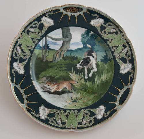 The eleventh plate features a blue rim with three clusters of white flowers and green leaves al…
