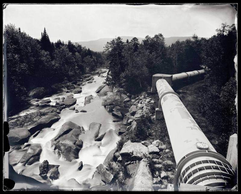 A pipeline running parallel to the Magalloway River.