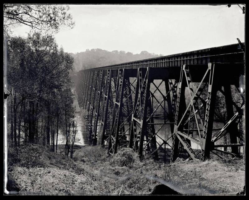 A railroad trestle crosses over the James River.