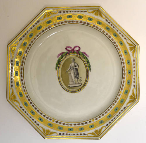 One of twelve octagonal plates with a sculptural figure inside an ovoid roundel crowned with a …