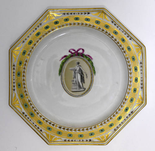 One of twelve octagonal plates with a sculptural figure inside an ovoid roundel crowned with a …