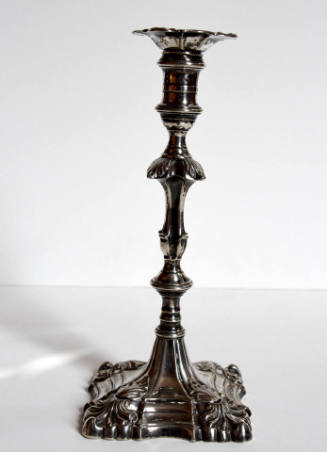 One of a pair of George III cast sterling silver candlesticks with removable bobeches. 