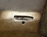 Maker's mark stamped on the bottom. 