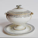 A circular gravy tureen with cover and stand from a fifty-one-piece dinner service of Wedgwood …