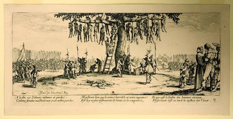 Onlookers encircle a large tree hung with the victims of a mass execution. 