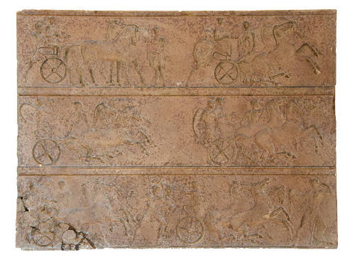 A rectangular block with three registers of chariot riders. 