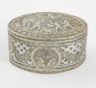 An oval gilded sterling silver box with mythological repousse decorations.