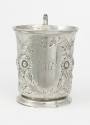 Christening cup adorned with a wreath of repoussé foliates containing the initials "GWO" for Ge…