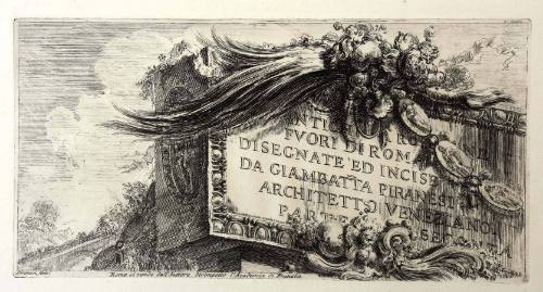 A large stone engraved with text bordered by the egg and dart motif and partially obscured by a…