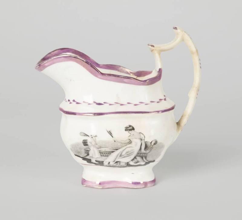 An English pink lusterware cream pitcher with a bat-printed transfer image of a woman and child…