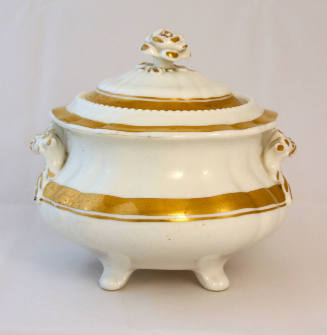 A porcelain sugar bowl from a four-piece tea service decorated with a white ground trimmed in g…