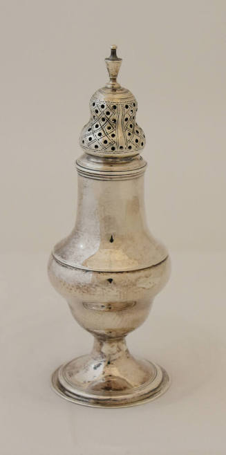 A Regency sterling silver caster with removable, pierced top, a classic baluster shape and stan…