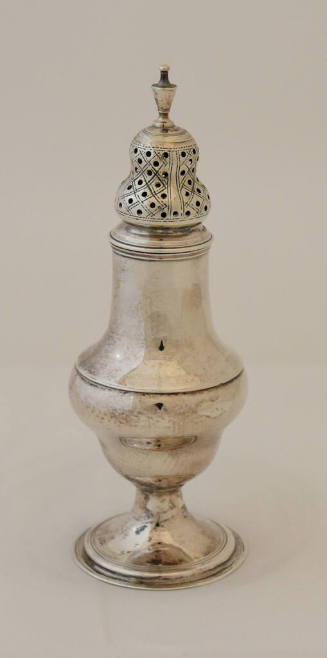A Regency sterling silver caster with removable, pierced top, a classic baluster shape and stan…