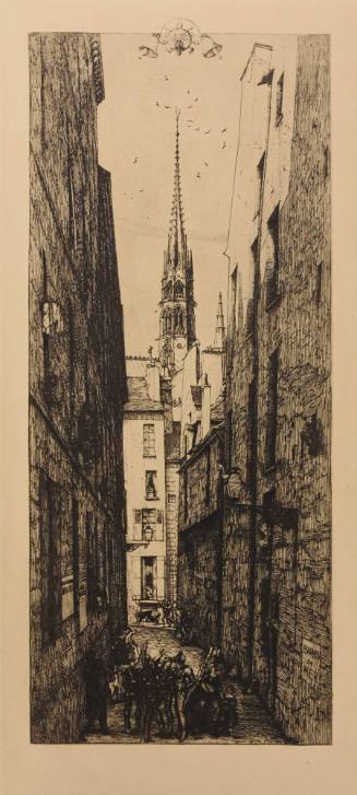A narrow, shaded street with a church spire above the immediate buildings.