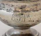 Monogram "EYW" on the side of the bowl.