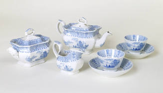 A nine-piece child's tea set comprised of decorated porcelain in a blue and white Chinese patte…