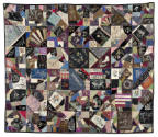 A colorful crazy quilt with numerous designs and motifs. 