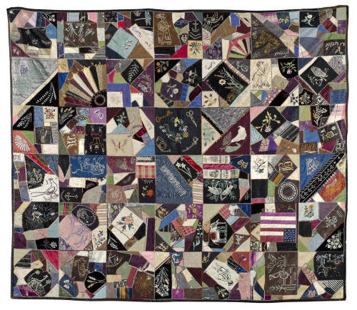 A colorful crazy quilt with numerous designs and motifs. 