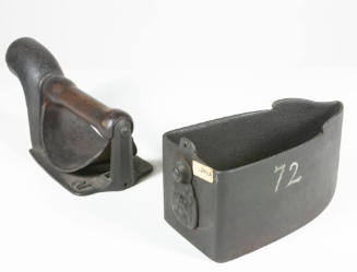A view of the handle removed from the base as seen from the behind. 