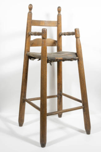 An oak ladderback highchair with turned arms and oval finials, two back splats, simple post leg…