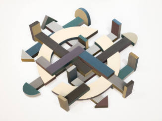 A set of interlocking and projecting wood boards that are painted in various colors of white, g…