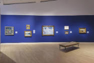 The north wall featuring a selection of American Impressionism paintings. 