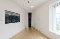 An installation shot of the northeast corner of the #art912 gallery with two works of art insta…