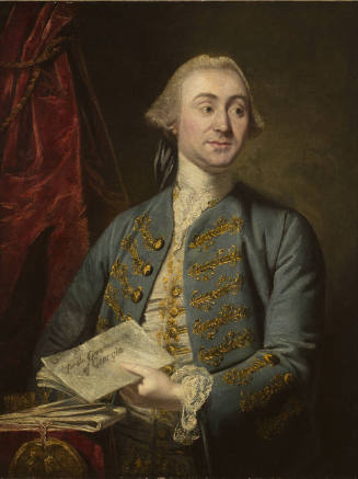 Portrait of a man holding a document.