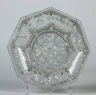 One of a pair of “Lacy Beehive” clear glass octagonal cake plates.