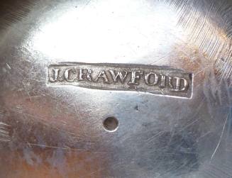 The maker's mark stamped on the bottom of the sugar bowl as "J.CRAWFORD" in a rectangle above a…