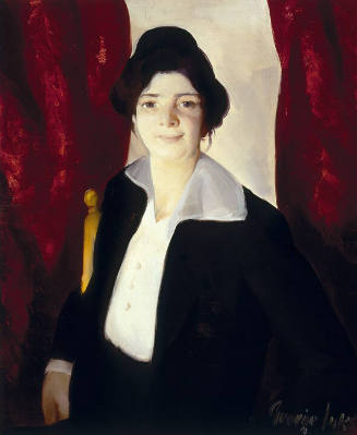 A half-length portrait of a woman with black hair piled into a bun wearing a black jacket and a…