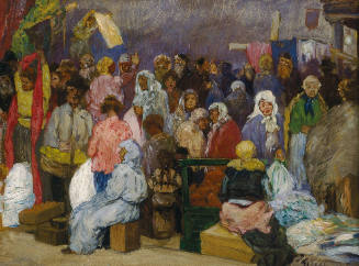 Street scene crowded with people, some seated on boxes. One woman holds up a length of red fabr…