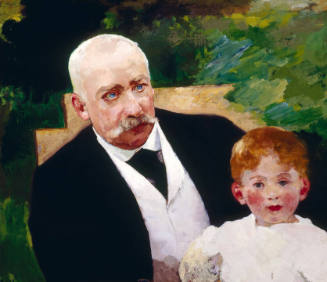 Portrait of a man wearing a dark suit with a white vest and a boy sitting in his lap.