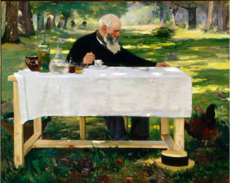 A man seated at a table in the foreground of a park setting, stirs his after-luncheon coffee wh…