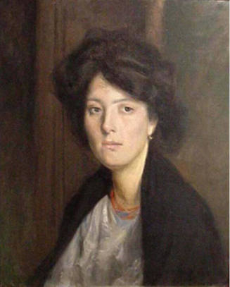 Bust-length portrait of a young woman wearing a coral-colored necklace and a black shawl.