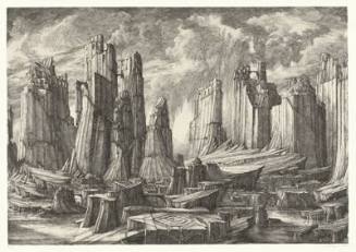 A rocky landscape with pillar-like rock formations with buildings carved from the rock on top. …