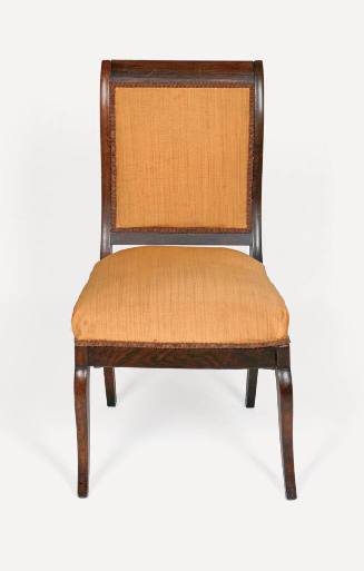 One of six Biedermeier-style upright mahogany side chairs with orange/yellow upholstered seats …