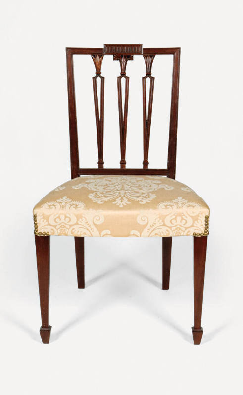 One of a pair of Sheraton-style side chairs with square backs, carved urn splats topped with fo…