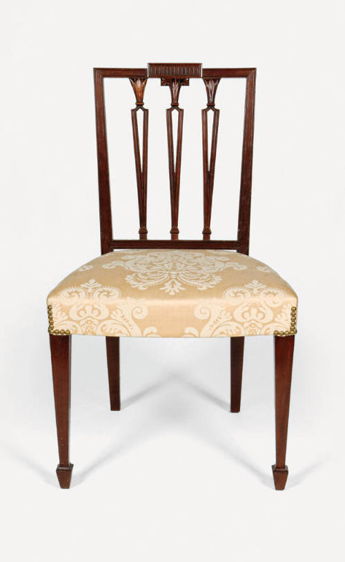 One of a pair of Sheraton-style side chairs with square backs, carved urn splats topped with fo…